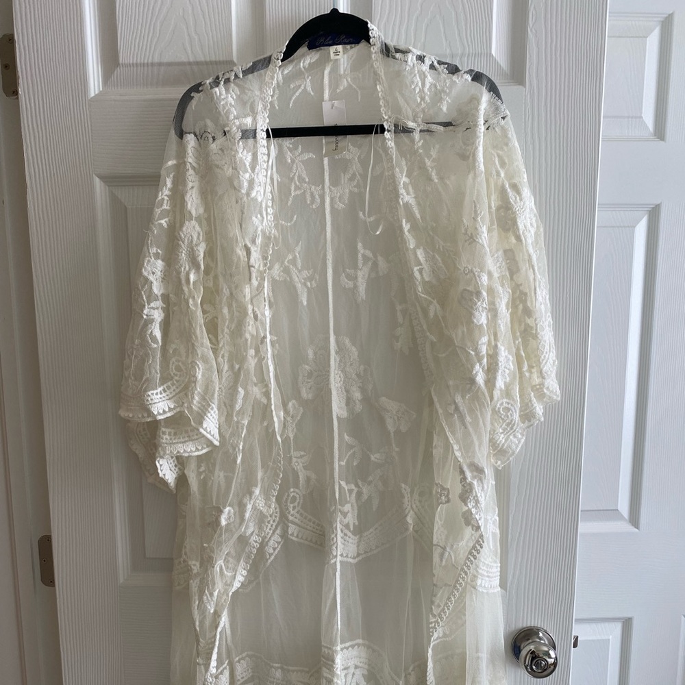Francesca’s ivory lace kimono